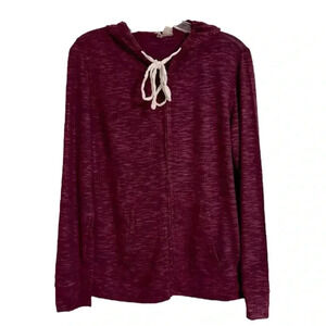 Just be Free cozy hoodie Size Medium features a stylish lace-up.